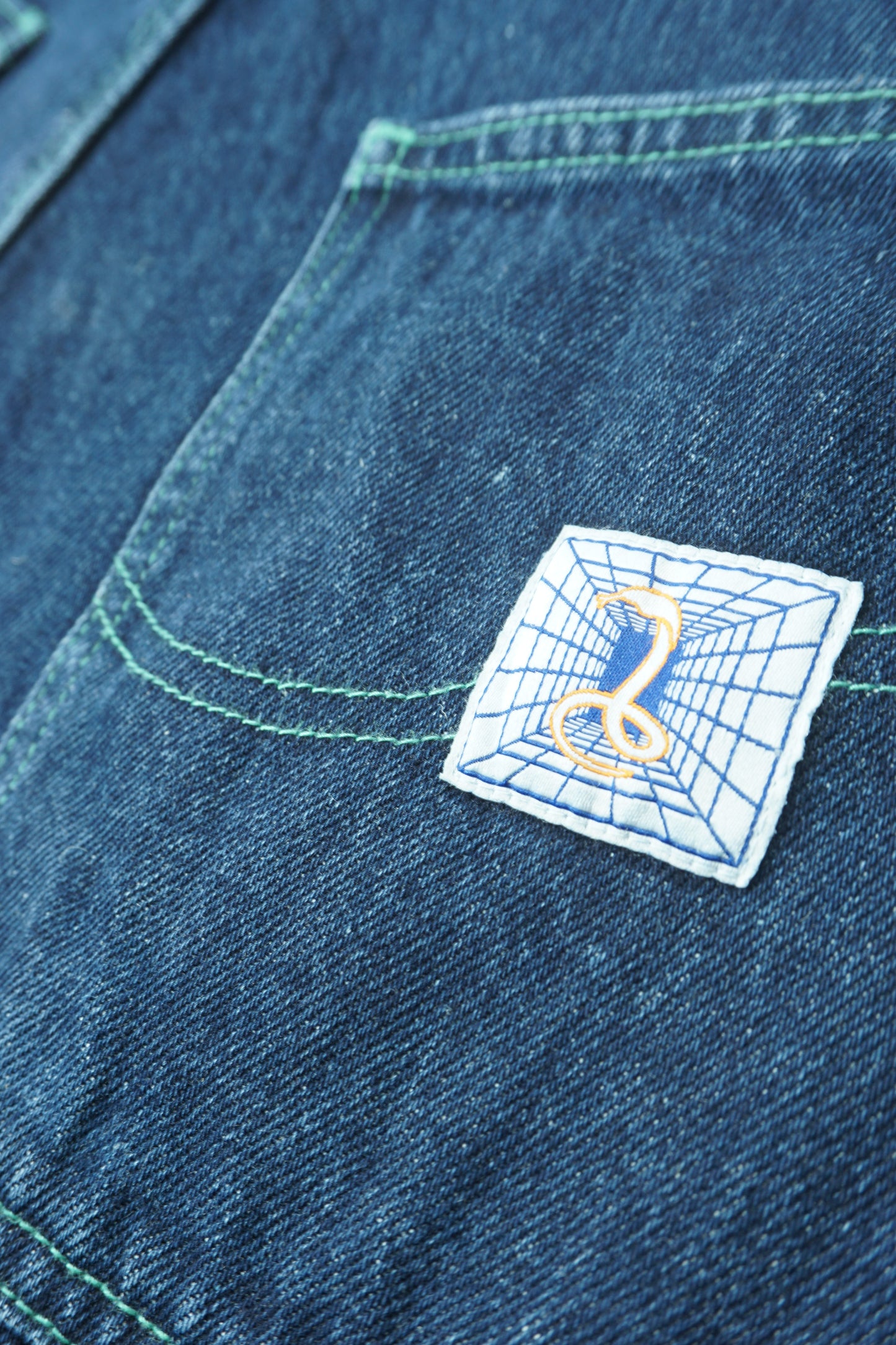 SNAKE HOLE Wide Denim – Green Stitch Dark Indigo